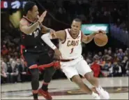  ?? ASSOCIATED PRESS FILE ?? Rodney Hood drives past the Raptors’ DeMar DeRozan on April 3.