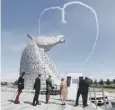  ??  ?? 0 The Queen got a warm ‘sky greeting’ at the Kelpies