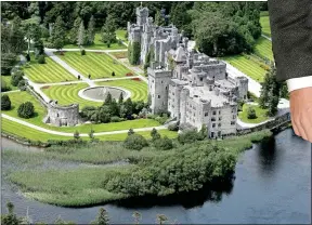  ??  ?? five star: Ashford Castle, above, has been block booked for four days from Wednesday; below, champagne in Ashford for McIlroy on New Year’s Eve 2015