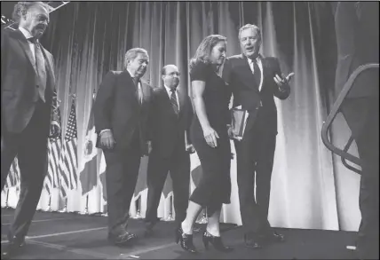  ?? CP PHOTO ?? U.S. Trade Representa­tive Robert Lighthizer, right, speaks with Canadian Foreign Affairs Minister Chrystia Freeland, second from right, as they leave a news conference, which included Mexico’s Secretary of Economy Ildefonso Guajardo Villarreal, at the...