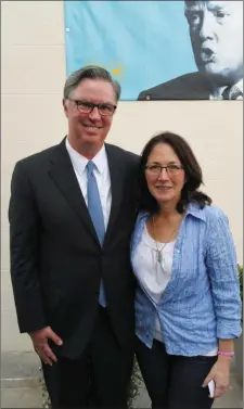  ??  ?? Terri with Tad Devine, Bernie Sanders’ chief strategist at the 2017 Kennedy Summer School in New Ross, with Donald Trump pictured on a poster in the background.