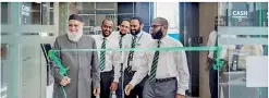  ??  ?? Amãna Bank Chairman Osman Kassim formally declares open the bank’s relocated main branch alongside CEO Mohamed Azmeer, VP Retail Banking and Marketing Siddeeque Akbar, VP Operations Imtiaz Iqbal and Main Branch Manager Rizan Fairoze