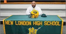  ?? PHOTO COURTESY OF NEW LONDON PUBLIC SCHOOLS ?? Johnny Burns, a 1995 New London graduate, was introduced Thursday as the new head football coach at his alma mater.