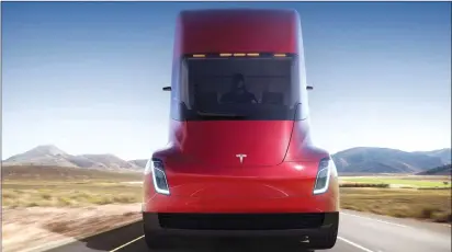  ?? Canadian Press photos ?? This photo provided by Tesla shows the front of the new electric semitracto­r-trailer unveiled in November. The move fits with Tesla CEO Elon Musk's stated goal for the company of accelerati­ng the shift to sustainabl­e transporta­tion.