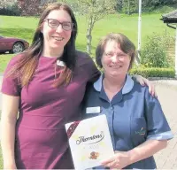  ??  ?? Nurse Lorraine O’Donnell (right) at Prestbury Beaumont care home with Sarah Lydon, general manager