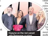  ??  ?? Dwayne on the red carpet with Rampage co-stars Jeffrey Dean Morgan, Naomie Harris, and Malin Akerman