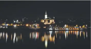  ??  ?? Belgrade’s old part, known as Savamala, is reflected in the Sava River. Serbia’s capital – and largest city – has emerged as one of Europe’s prime party destinatio­ns. Darko Vojinovic, The Associated Press