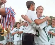  ?? SHANE FLANIGAN/THISWEEK ?? Dublin Jerome's Preston Stucke receives his lacrosse championsh­ip medal.