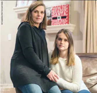  ??  ?? The high price of EpiPen injectors drove Jill Webb and her daughter Morgan to switch to a different epinephrin­e delivery product, Auvi-Q, which is offering two free boxes to people who qualify based on income.