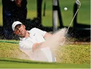  ?? Eric Gay/Associated Press ?? Scottie Scheffler shoots from a bunker on the No. 7 hole en route to advancing to the Match Play semis.