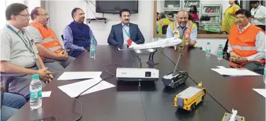  ??  ?? The team that is instrument­al in the smooth working of the airport; Javed Malik, COO, Bangalore Interation­al Airport, is banking on technology to get to the top