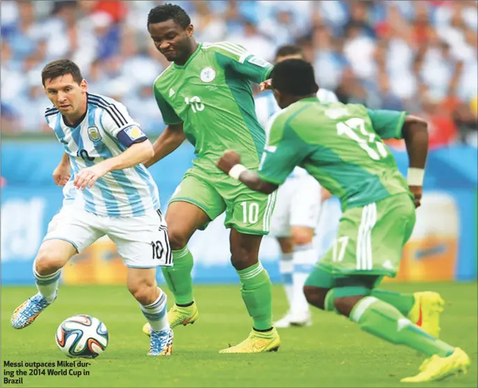  ??  ?? Messi outpaces Mikel during the 2014 World Cup in Brazil