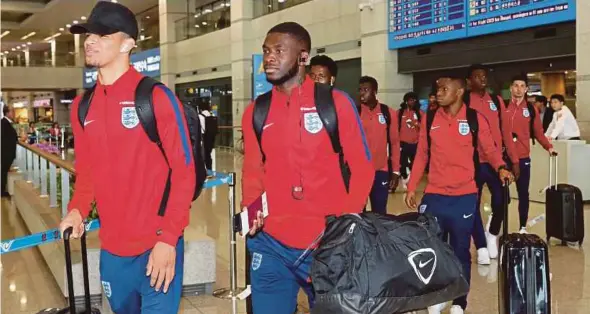  ?? EPA PIC ?? The England Under-20 World Cup squad arrive at Incheon Internatio­nal Airport in South Korea on Monday.