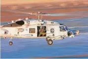  ?? Media photo via Lockheed Martin ?? A U.S. Navy MH-60R Seahawk helicopter in flight, built by the Stratford-based Sikorsky subsidiary of Lockheed Martin.
