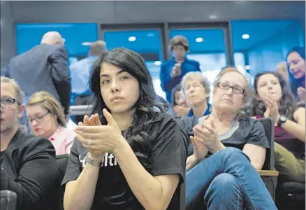  ?? Lezlie Sterling ?? ANDREA TORRES
applauds at a Sacramento County workshop that considered options for restoring health access to immigrants.