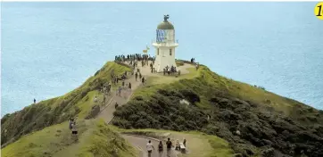  ??  ?? 10 Cape Reinga. This lighthouse looks out to the vast ocean where we witnessed two bodies of water meet, the Tasman Sea and the Pacific Ocean. It’s a six-hour drive from Auckland Central but the views along the way are amazing.