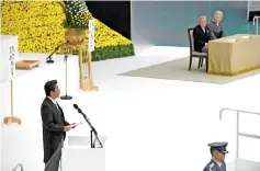  ??  ?? Abe (left) delivers his speech as Emperor Akihito (back left) and Empress Michiko (back right) look on during the annual official memorial service for war victims in Tokyo on the 73rd anniversar­y of Japan’s defeat in World War II. — AFP photo