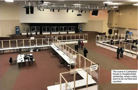  ??  ?? The scene in Cathedral House in Huddersfie­ld yesterday, where votes were to be verified and counted