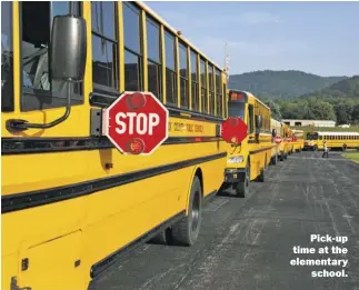  ?? FILE PHOTO BY LUKE CHRISTOPHE­R ?? Pick-up time at the elementary school.