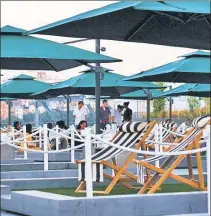  ??  ?? GOING GREEN: The Rooftop at Pier 17’s new venue, The Greens, has become a hot spot at the South Street Seaport.