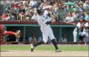  ?? PHOTO BY JOE BOYLE ?? Alex McKenna swings for a single against the Auburn Doubledays on at Joe L. Bruno Stadium.