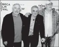  ??  ?? Robert De Niro (from left), Burt Reynolds and Chevy Chase seem like long-lost friends at the premiere of Reynolds’ latest film Dog Years, which also stars Glenwood native Clark Duke.