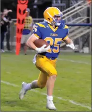  ?? Staff photo/Mike Zwez ?? Marion Local’s Kyle Otte carries the ball Friday night against Versailles.