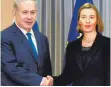  ?? FOTO: AFP ?? Schwierige­s Treffen in Brüssel: Benjamin Netanjahu und Federica Mogherini.