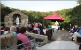  ??  ?? Open air Mass celebrated at the Well in Tullylease.