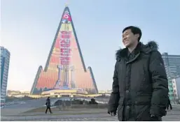  ?? DITA ALANGKARA/AP ?? Light designer Kim Yong Il made the pyramid-shaped Ryugyong Hotel once again the talk of the town.