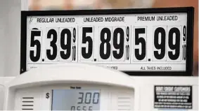  ?? Christian Abraham / Hearst Connecticu­t Media file photo ?? Before the gas-tax holiday, prices surpassed $5 at a Stamford gas station last March.