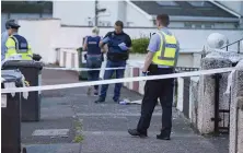  ??  ?? Gardaí investigat­e the stabbing of a man at a house on Rutland Grove, Crumlin, Dublin, last night. Photo: Arthur Carron