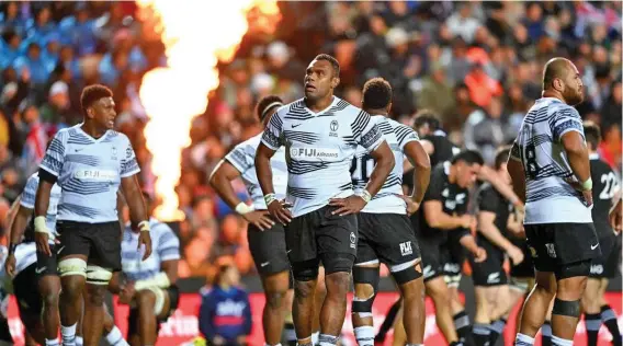  ?? Photo: Newshub ?? Flying Fijians players (left-right) Temo Mayanavanu­a, captain Leone Nakarawa, Leeroy Atalifo at the sound of the final whistle against the All Blacks at the FMG Stadium Waikato, on July 17, 2021