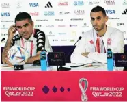  ?? ?? Tunisia’s midfielder Ellyes Skhiri (right) and team coach Jalel Kadri attend a press conference at the Qatar National Convention Centre (QNCC) in Doha yesterday.