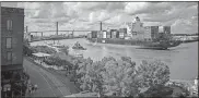  ?? Ap-stephen B. Morton, File ?? In this 2014 file photo, The container ship Zim Istanbul makes it’s way up the Savannah River past historic River Street in Savannah.