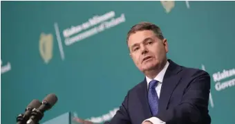  ?? GETTY IMAGES ?? IN AGREEMENT: Ireland's finance minister Paschal Donohoe speaks during a press conference in Dublin Thursday, expressing his country’s agreement to the tax rate.