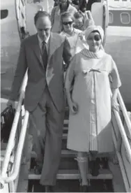  ?? THE ASSOCIATED PRESS FILE PHOTO ?? Wearing a patch over her eye and a brace on her leg, Patricia Neal and Roald Dahl arrive in London in 1965. A stroke left Neal partly paralyzed and her speech impaired.