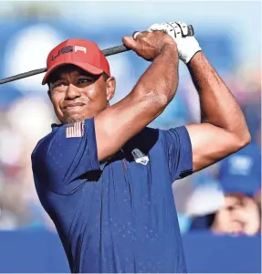  ?? IAN RUTHERFORD/USA TODAY SPORTS ?? Tiger Woods isn’t playing in the PGA Tour season opener, but he will tee it up at the Hero World Challenge in the Bahamas.