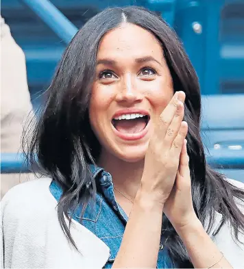  ??  ?? The Duchess of Sussex cheered on her friend Serena Williams from courtside at the US Open final last night in New York, her first overseas trip without Archie, her four-month-old son. Williams lost to Bianca Andreescu in straight sets.