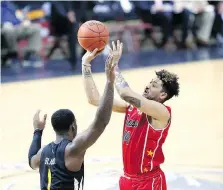  ?? NICK BRANCACCIO ?? Ryan Anderson, right, tangles with Jaylen Bland of the Sudbury Five at the WFCU Centre on Wednesday.