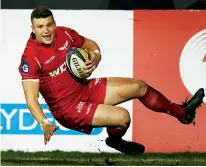  ??  ?? Moving on: Scott Williams scores for Scarlets