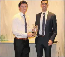  ??  ?? Cathal Mullaney receives Enniscrone/ Kilglass Club Person of the Year from Brian Coleman of Coleman Electronic­s, sponsor.
