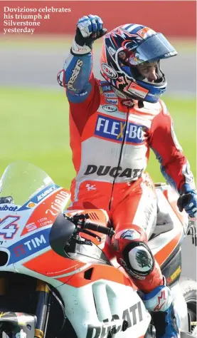  ??  ?? Dovizioso celebrates his triumph at Silverston­e yesterday