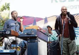  ?? Scott Strazzante/The Chronicle 2022 ?? Robert Glasper on keyboard and Dave Chappelle at the microphone at the 2022 Blue Note Jazz Festival Napa Valley. Chappelle, angered by the curfew, vowed never to return.
