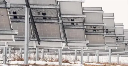  ??  ?? Solar panels in a five-acre field on Route 7 are part of a community solar farm in Pittstown.