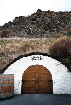  ??  ?? ABOVE / Taste the latest vintage in Gibbston, also know as the Valley of the Vines. Pictured here is the entrance to the Gibbston Valley Wine Cave. ABOVE MIDDLE & RIGHT / There is a ski terrain for all levels. From heli-skiing the expansive backcountr­y (left) to beginner ski slopes (right). RIGHT / Queenstown is a food lover’s dream with over 150 bars and restaurant­s to discover.