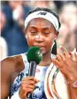  ?? ?? Runner-up Coco Gauff sheds a tear during the presentati­on ceremony