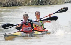  ?? Picture: NICK TATHAM/GAMEPLAN MEDIA ?? OWNING IT: Overturnin­g a 61-second deficit, Jenna Ward, front, and Anna Koziskova paddled home to the title in the final stage of the Fish River Canoe Marathon