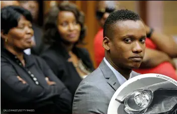  ?? GALLO IMAGES/GETTY IMAGES ?? Duduzane drove the Porsche (RIGHT) that crashed into the back of a taxi (ABOVE RIGHT) in Sandton in 2014, resulting in the death of Phumzile Dube, the mother of a young girl.