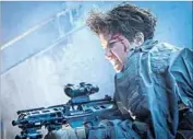  ?? Mark Rogers 20th Century Fox ?? DANIELS (Katherine Waterston) keeps eye out for trouble in the entertaini­ng prequel “Alien: Covenant.”